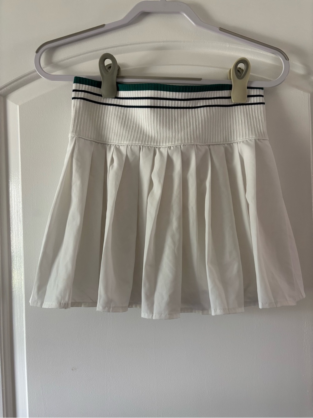 White Pleated Mini Skirt with Striped Waistband and built in shorts
